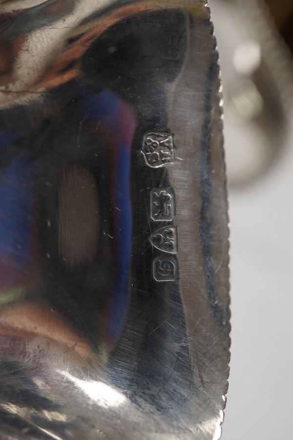 A silver quaich, E J Gallichan & Co Ltd, Sheffield, 1962, diameter 10.2cm, together with a silver sauceboat and a small silver dish, 10.1oz. Condition - fair